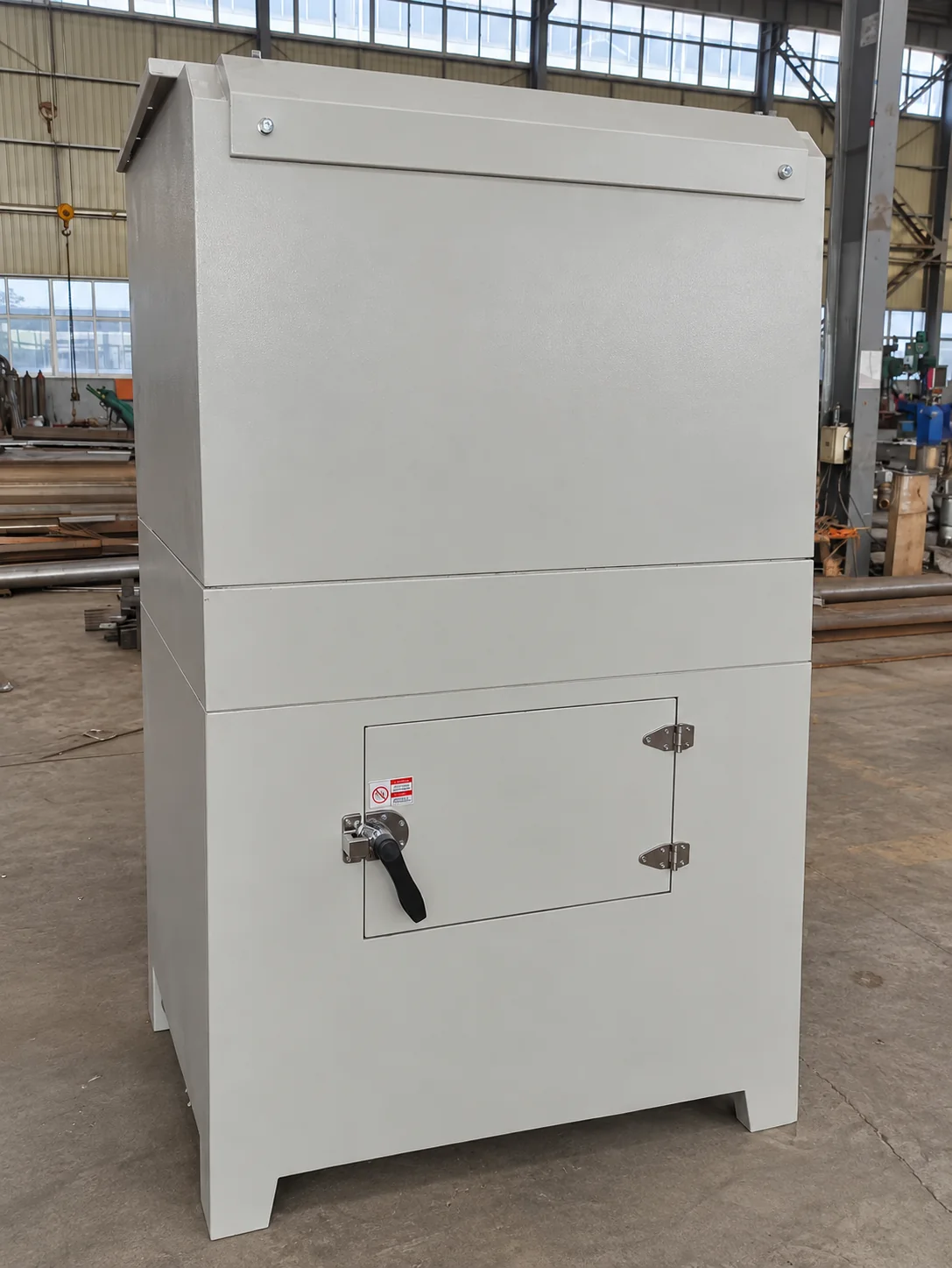 Metal cabinet with a lower access door, handle and two hinges
